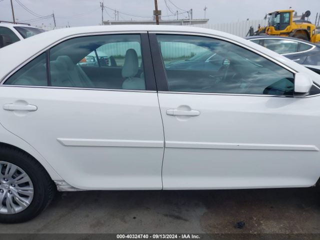 4T1BD1FK1EU099581 Toyota Camry Hybrid Le
