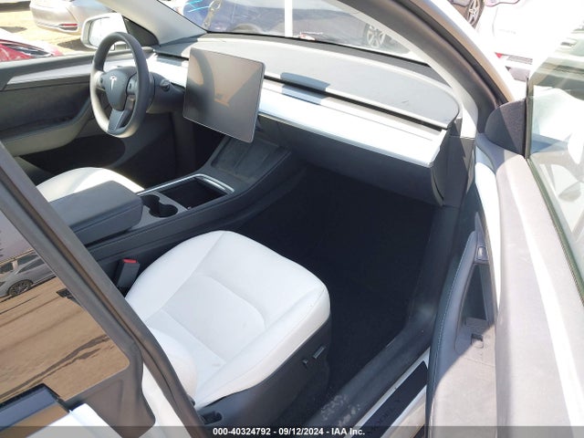 2023 TESLA MODEL Y 7SAYGAEE0PF794358 Photo 4