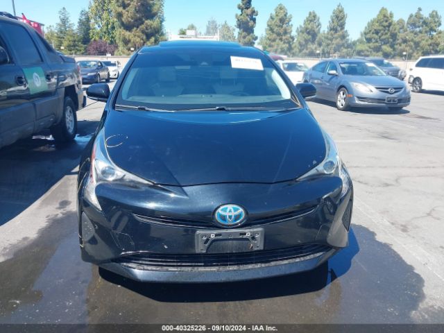 JTDKARFU0G3011335 Toyota Prius Four