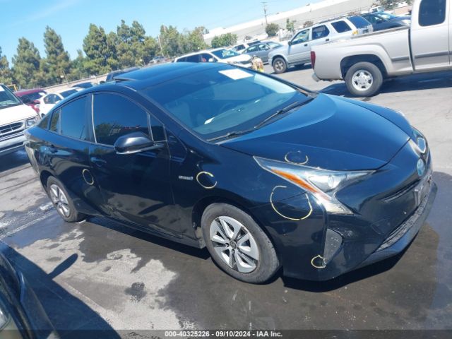 JTDKARFU0G3011335 Toyota Prius Four