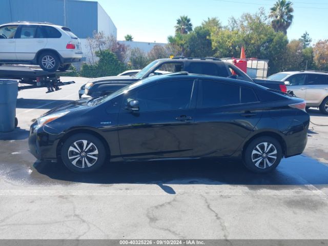 JTDKARFU0G3011335 Toyota Prius Four