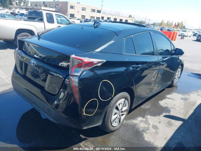 JTDKARFU0G3011335 Toyota Prius Four