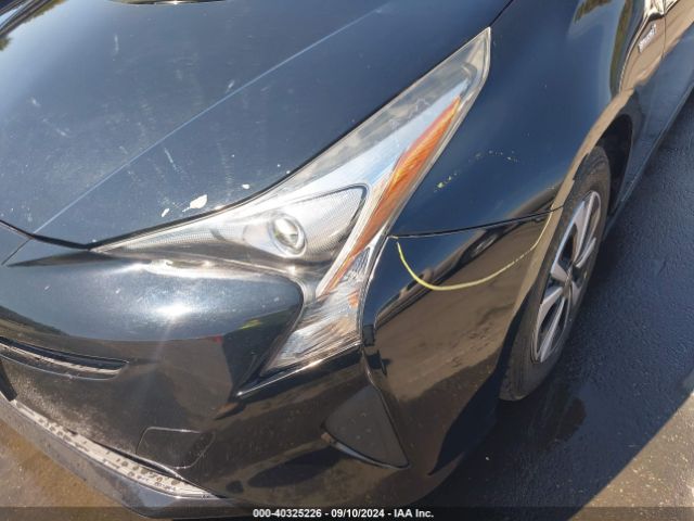 JTDKARFU0G3011335 Toyota Prius Four