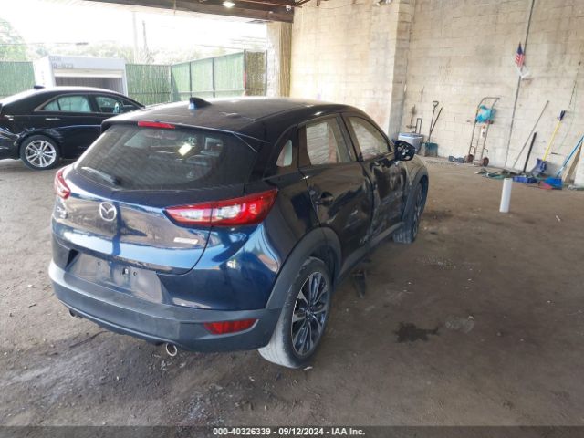 JM1DKFC72K0401382 Mazda Cx-3 Touring