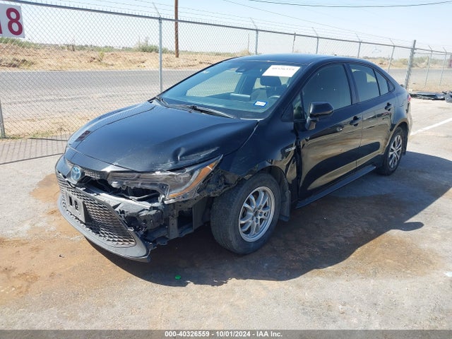 Toyota Corolla Hybrid Le 2021 JTDEAMDE8MJ033411 Image 2