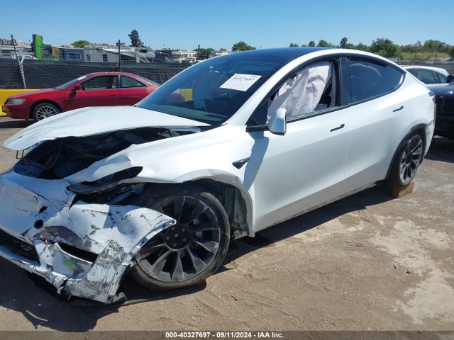 2023 TESLA MODEL Y 7SAYGDEE4PF692269 Photo 1
