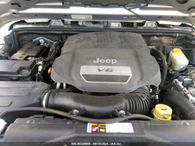 1C4BJWDG8EL139637 Jeep Wrangler Unlimited Sport