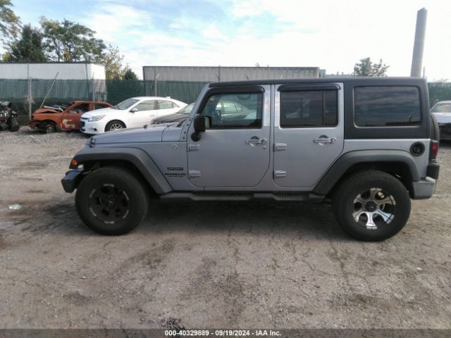 1C4BJWDG8EL139637 Jeep Wrangler Unlimited Sport