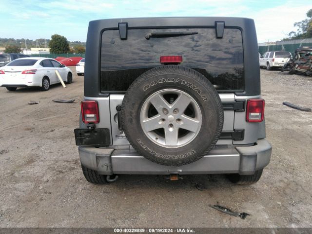 1C4BJWDG8EL139637 Jeep Wrangler Unlimited Sport