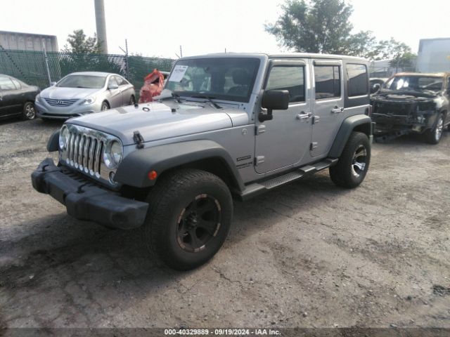 1C4BJWDG8EL139637 Jeep Wrangler Unlimited Sport