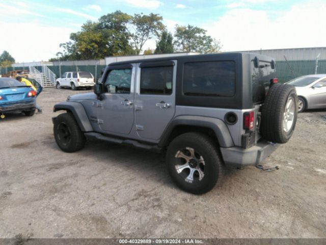 1C4BJWDG8EL139637 Jeep Wrangler Unlimited Sport