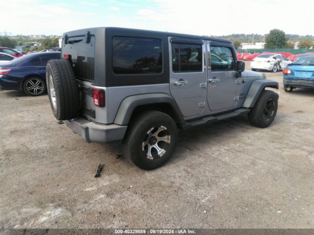 1C4BJWDG8EL139637 Jeep Wrangler Unlimited Sport