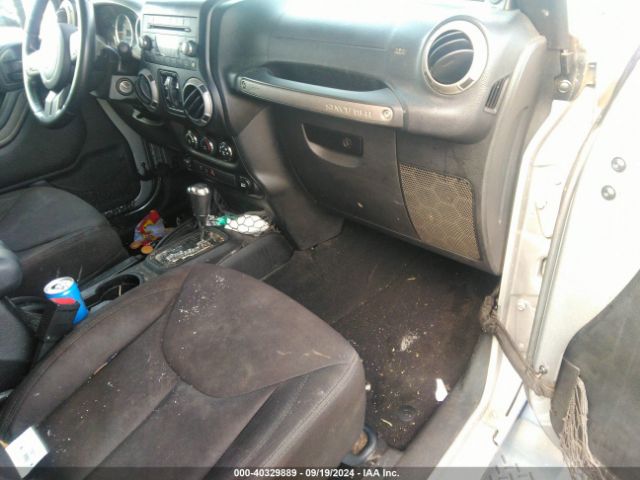 1C4BJWDG8EL139637 Jeep Wrangler Unlimited Sport