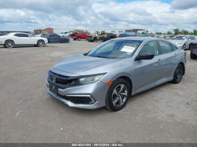 19XFC2F6XKE023997 Honda Civic Lx