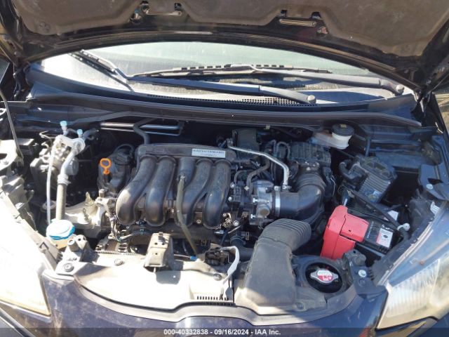 JHMGK5H59GX014338 Honda FIT LX