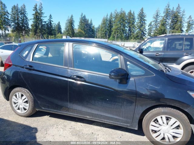 JHMGK5H59GX014338 Honda FIT LX