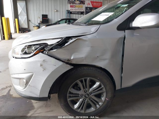 KM8JUCAG1EU907664 Hyundai TUCSON SE