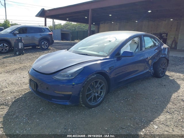 2023 TESLA MODEL 3 5YJ3E1EB5PF386165 Photo 1