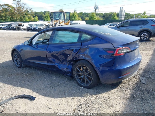 2023 TESLA MODEL 3 5YJ3E1EB5PF386165 Photo 2