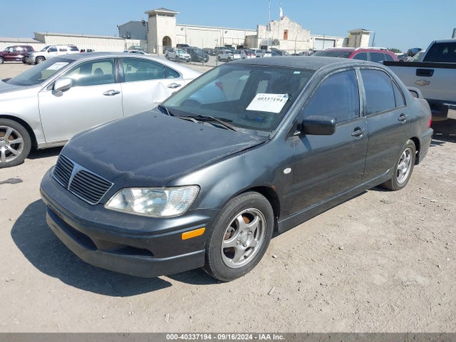 2002 MITSUBISHI LANCER JA3AJ86E02U041354 Photo 1