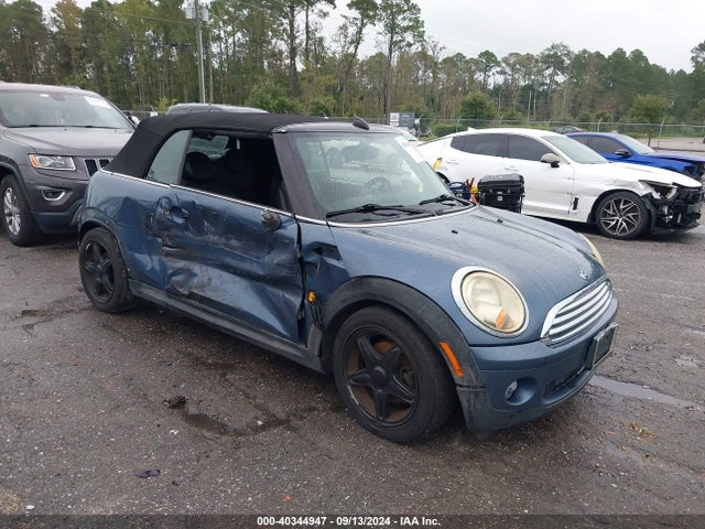 2009 MINI COOPER WMWMR33589TU95931 Photo 0