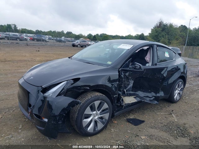 2024 TESLA MODEL Y 7SAYGDEE5RA214619 Photo 1