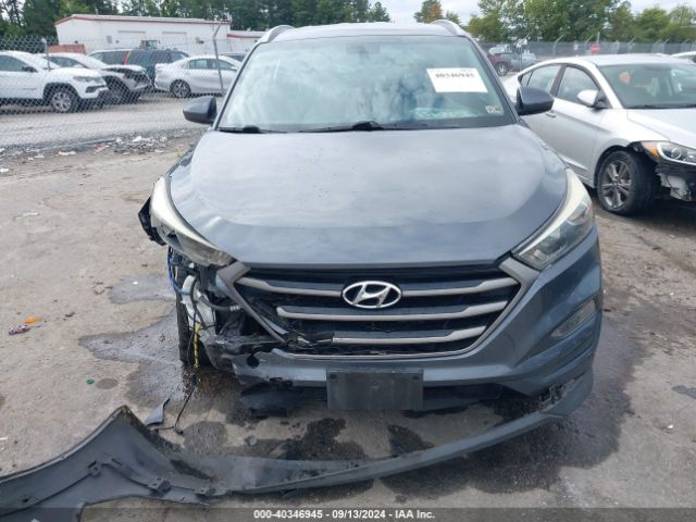 KM8J3CA49GU037030 Hyundai TUCSON SE