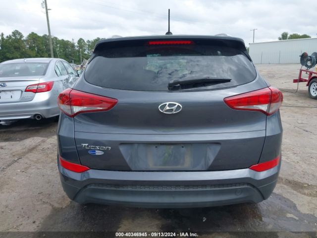KM8J3CA49GU037030 Hyundai TUCSON SE