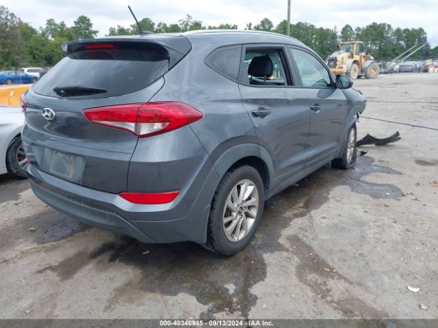 KM8J3CA49GU037030 Hyundai TUCSON SE