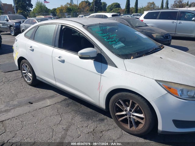 Ford FOCUS SE 2017 1FADP3F24HL237856 Image 13