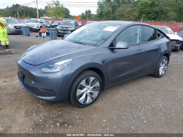 2023 TESLA MODEL Y 7SAYGDED9PF933184 Photo 1