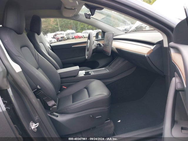 2023 TESLA MODEL Y 7SAYGDED9PF933184 Photo 4