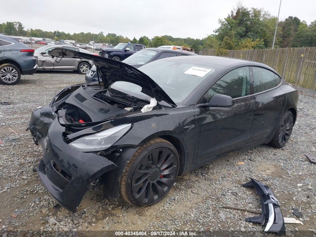 2021 TESLA MODEL 3 5YJ3E1EC2MF990910 Photo 1