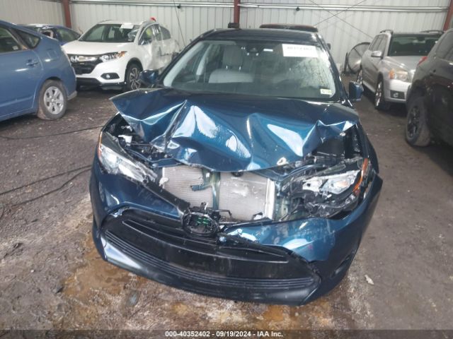 2T1BURHE4JC042762 Toyota COROLLA LE