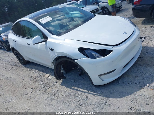 2024 TESLA MODEL Y 7SAYGDEE5RA281298 Photo 0