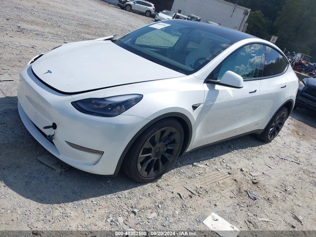 2024 TESLA MODEL Y 7SAYGDEE5RA281298 Photo 1