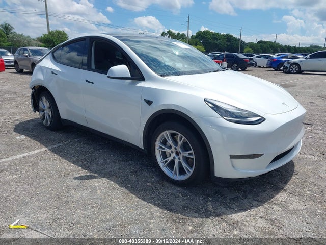 2023 TESLA MODEL Y 7SAYGDEE6PA128653 Photo 0