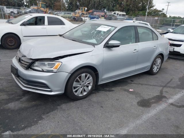 3VWD17AJ5FM405675 Volkswagen Jetta 1.8t Se