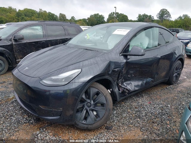 2024 TESLA MODEL Y 7SAYGAEE4RF157380 Photo 1