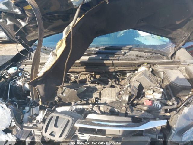 2HKRM4H34GH610305 Honda CR-V LX