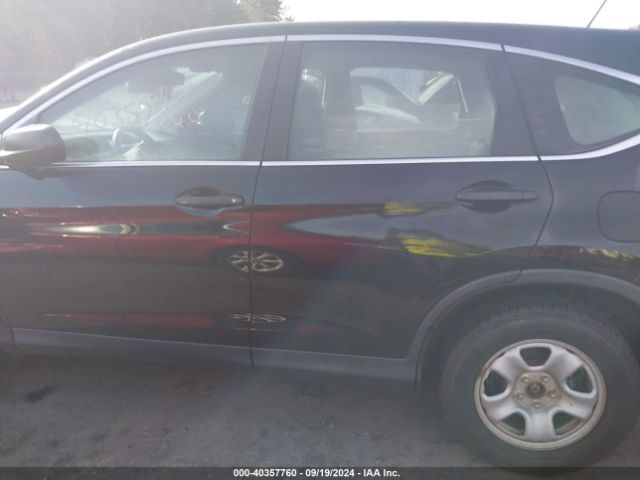 2HKRM4H34GH610305 Honda CR-V LX