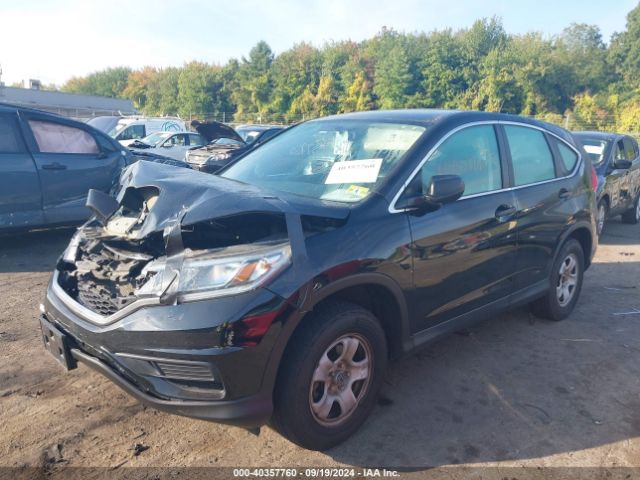 2HKRM4H34GH610305 Honda CR-V LX