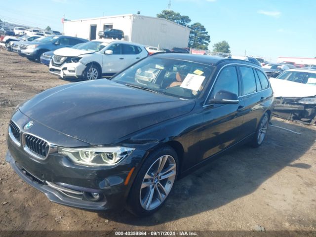 2017 BMW 3 SERIES WBA8K3C35HA022549 Photo 1