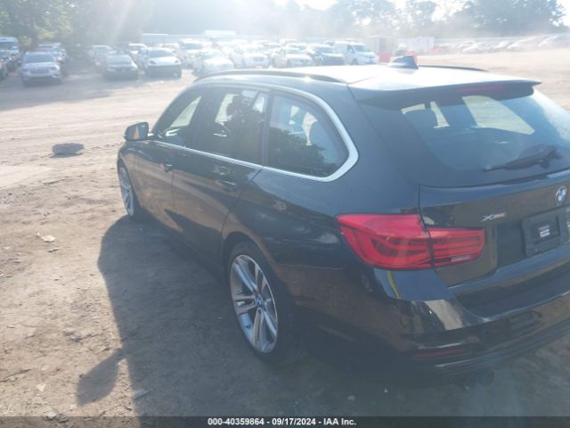 2017 BMW 3 SERIES WBA8K3C35HA022549 Photo 2