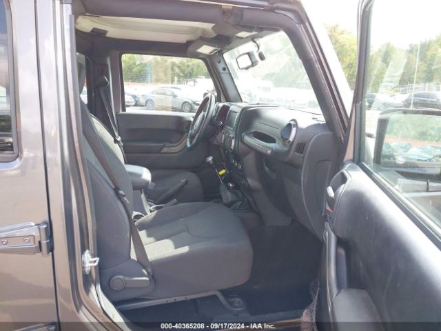 1C4BJWDG3GL234125 Jeep Wrangler Unlimited Sport
