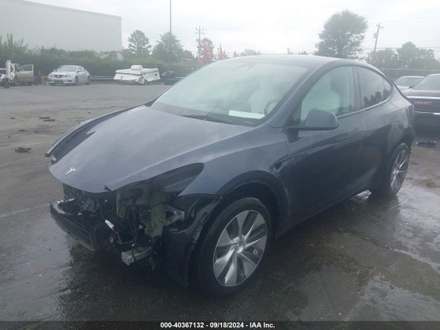 2023 TESLA MODEL Y 7SAYGDEE7PF627495 Photo 1