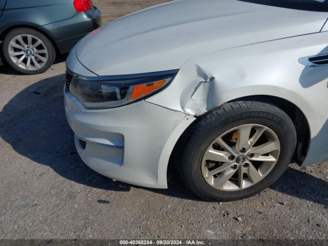 KNAGT4L38G5105317 KIA Optima Lx