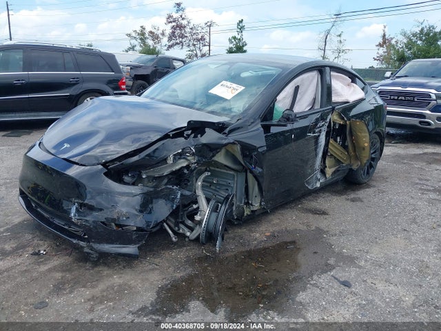 2024 TESLA MODEL Y 7SAYGDED2RF023959 Photo 1