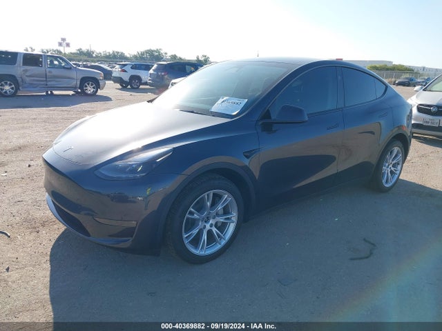 2024 TESLA MODEL Y 7SAYGDEE9RA226143 Photo 1