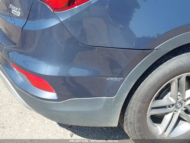 5NMZTDLB9JH097915 Hyundai Santa Fe Sport 2.4l